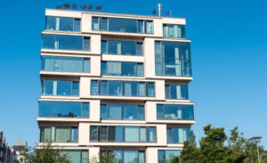 apartment building illustrating utility bill collection
