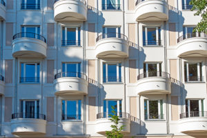 apartment building facade illustrating utility billing